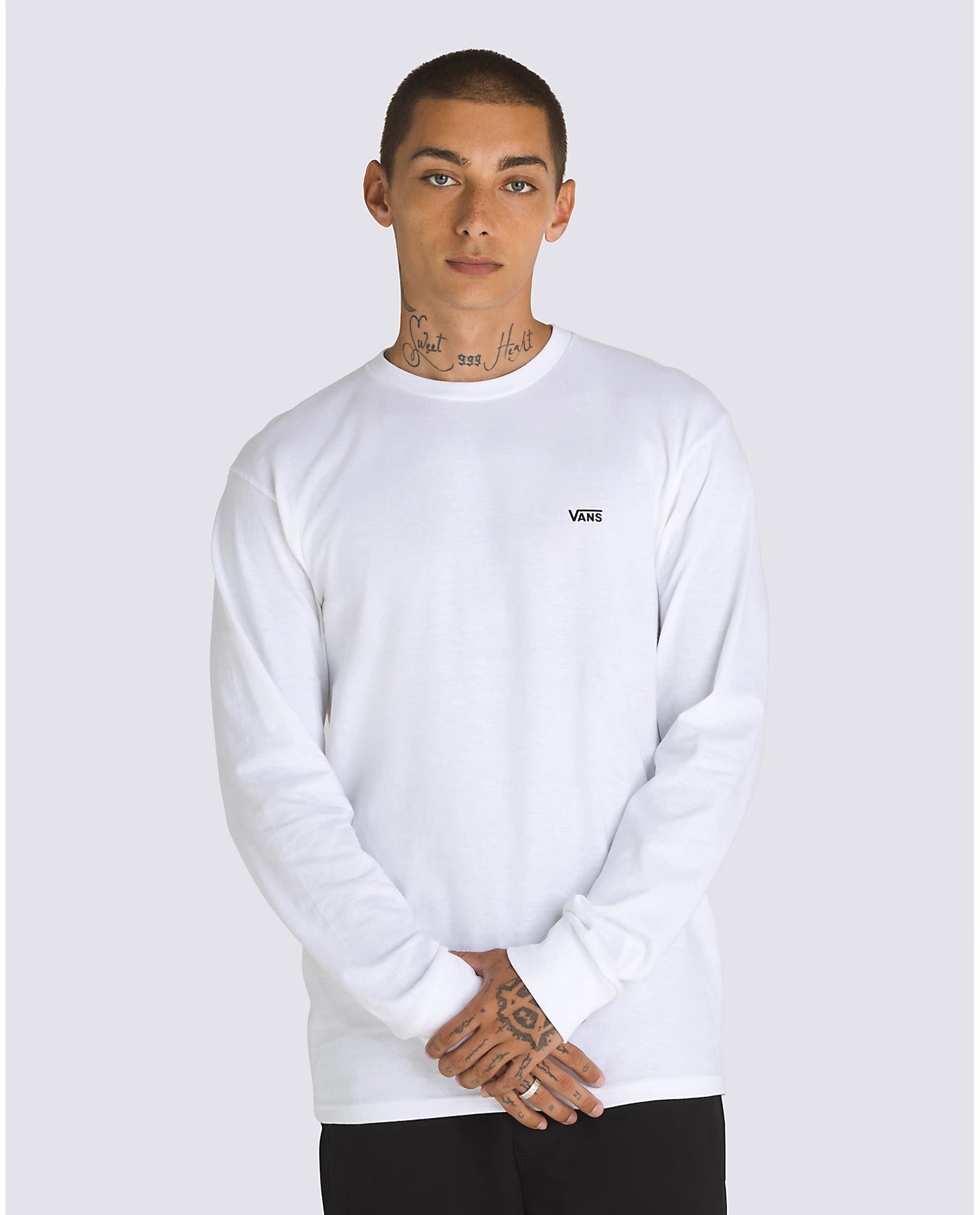 The white and black Left Chest Hit Long Sleeve T-Shirt by Vans