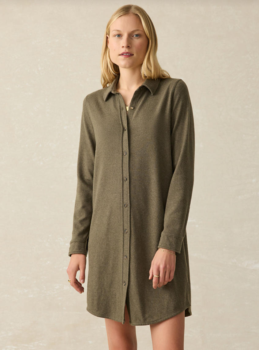 Front view of a woman wearing the Olive Melange Twill Legend Sweater Dress by Faherty