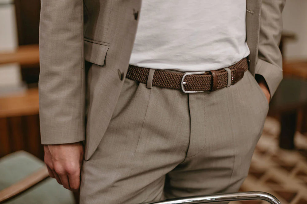 
                      
                        Man wearing the La Boucle Florence Belt in the color Brown
                      
                    