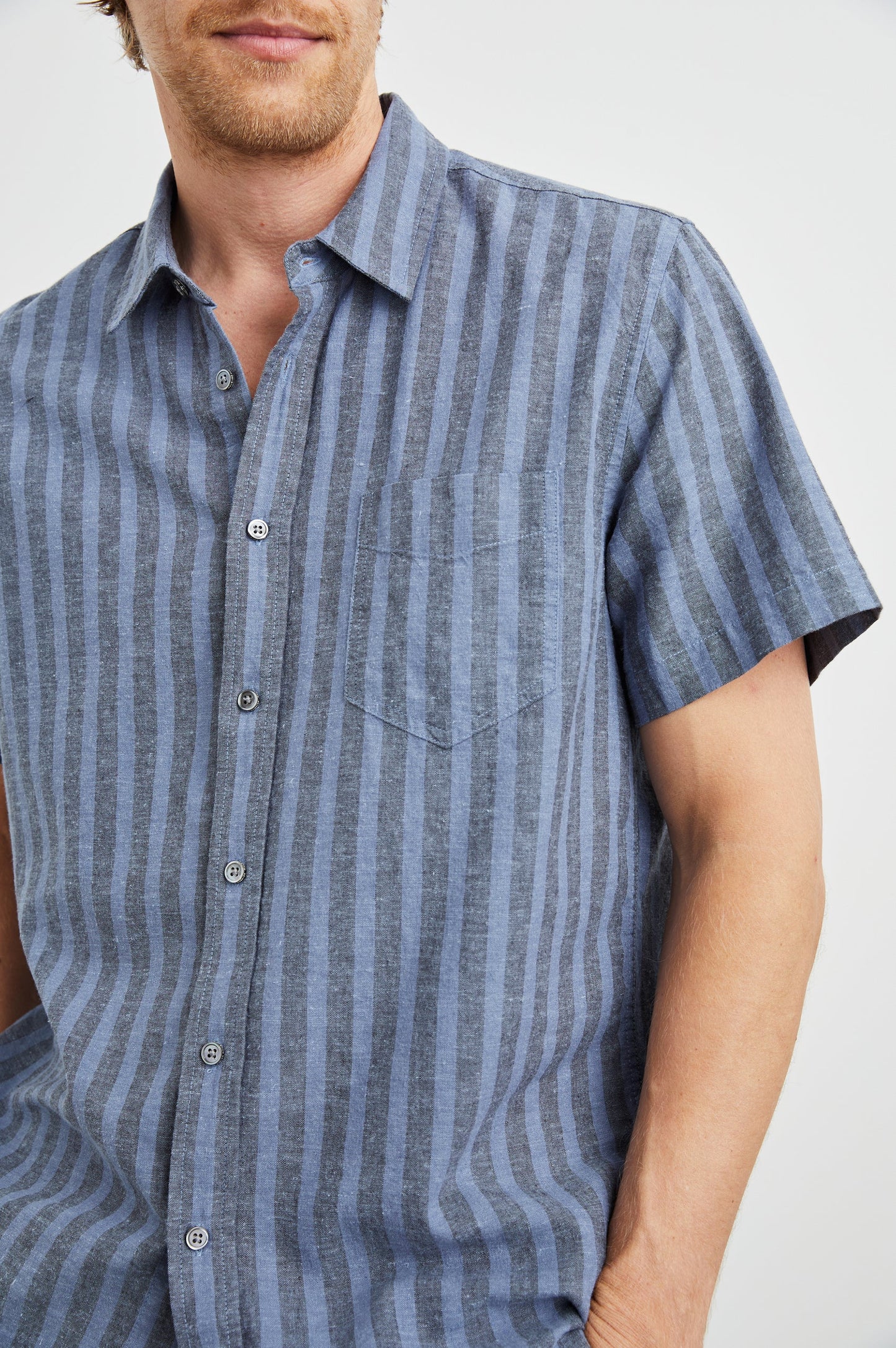 Men's blue striped short sleeve button down shirt with front chest pocket