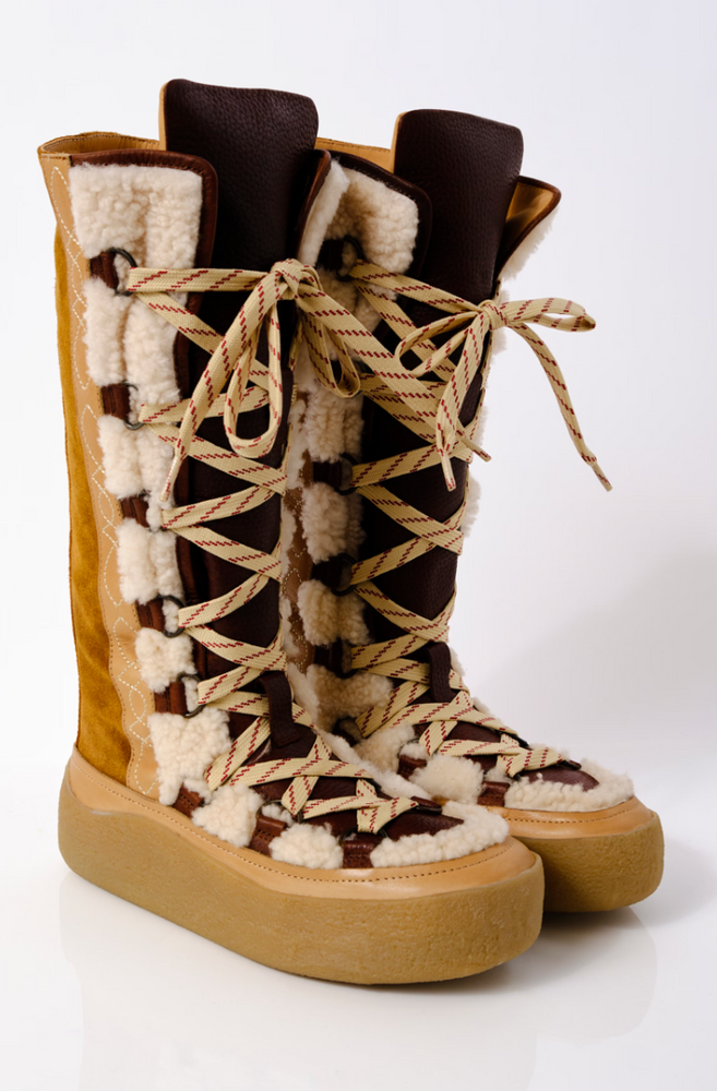 
                      
                        The Wilder Mukluk Boot by Free People
                      
                    