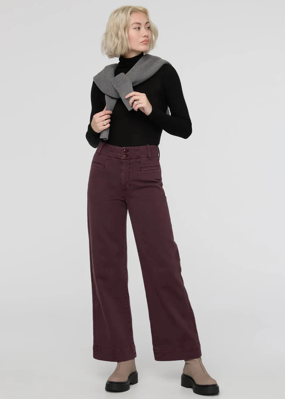 Front view of a woman wearing the Raisin LuxTwill High Rise Trouser by DU/ER