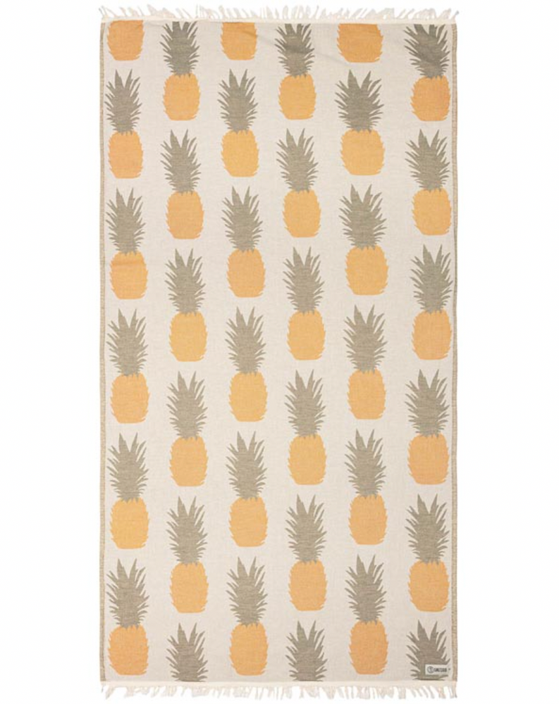 Enjoy your time in the sand with the eco-conscious Sand Cloud Pineapple Towel, available at Harbour Thread boutique. 