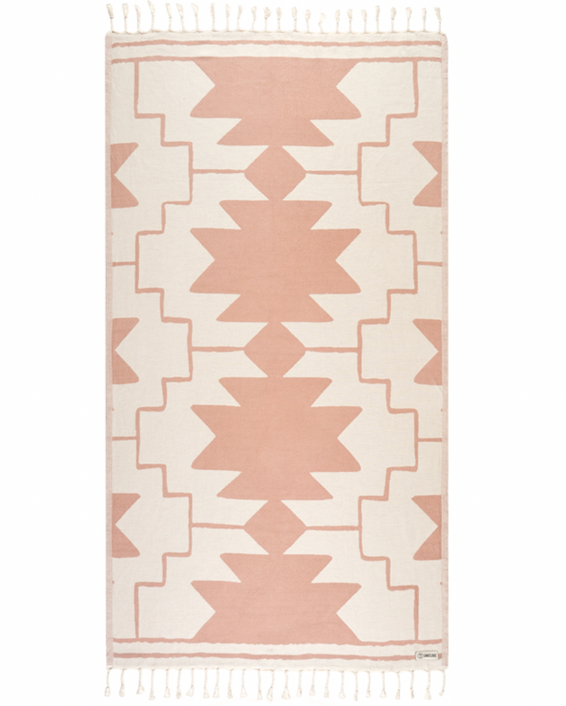 Enjoy your time in the sand with the eco-conscious Sand Cloud Sandstone Towel, available at Harbour Thread boutique. 