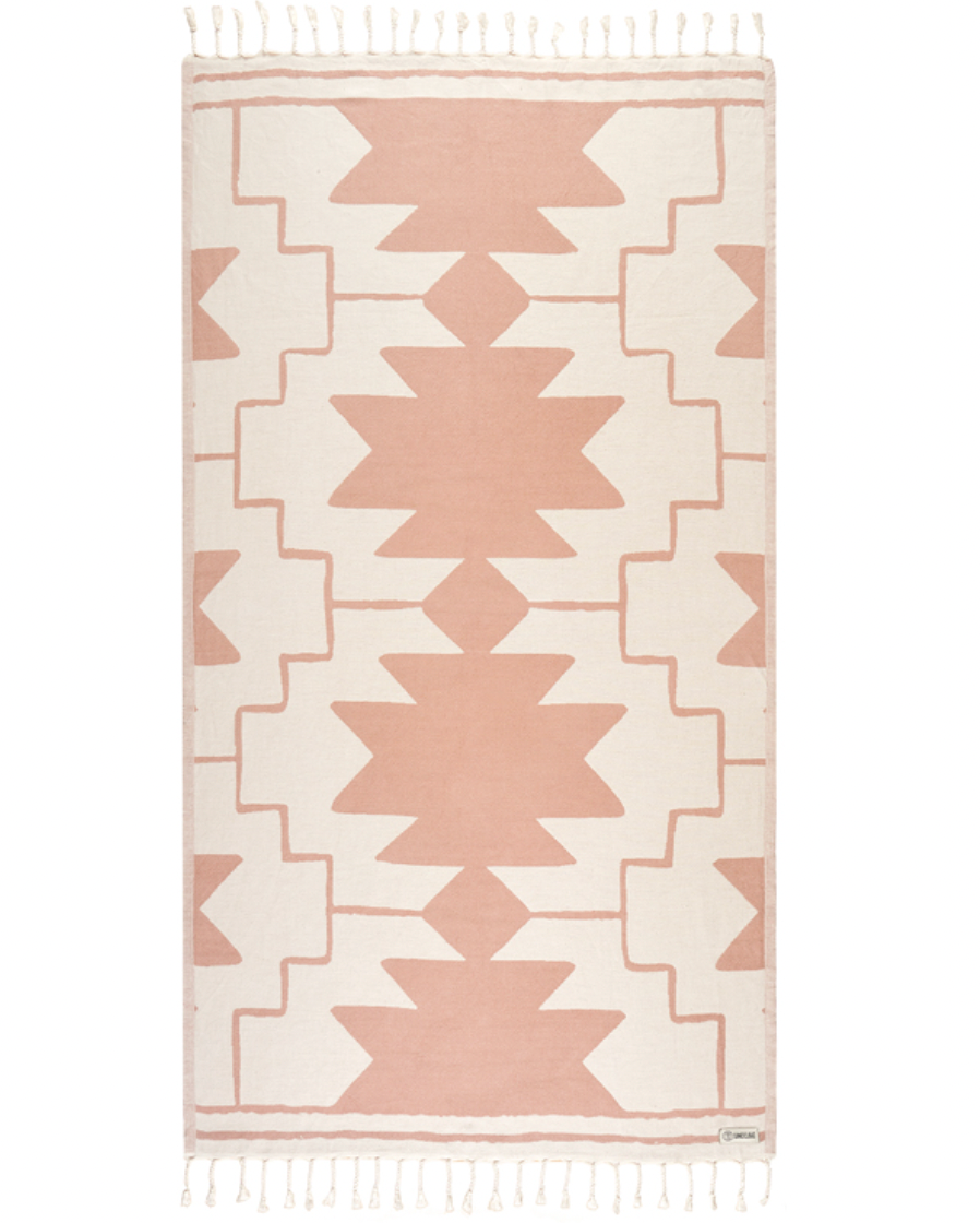 Enjoy your time in the sand with the eco-conscious Sand Cloud Sandstone Towel, available at Harbour Thread boutique. 