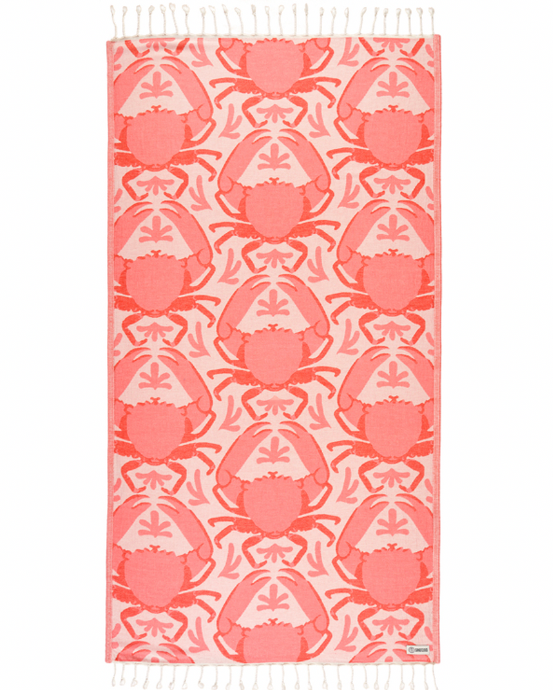 Enjoy your time in the sand with the eco-conscious Sand Cloud Crabby Towel, available at Harbour Thread boutique. 