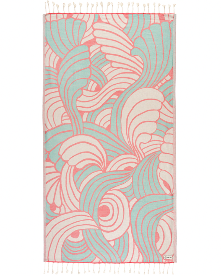 Enjoy your time in the sand with the eco-conscious Sand Cloud Shuimu Towel, available at Harbour Thread boutique. 