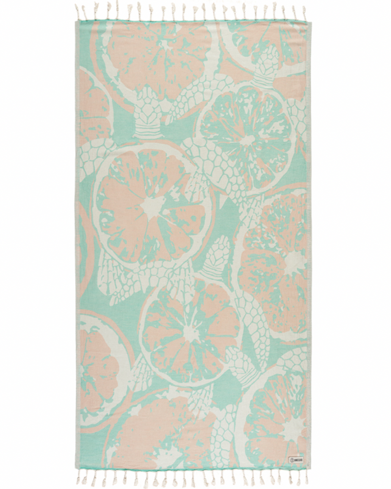 Enjoy your time in the sand with the eco-conscious Sand Cloud Oroblanco Towel, available at Harbour Thread boutique.