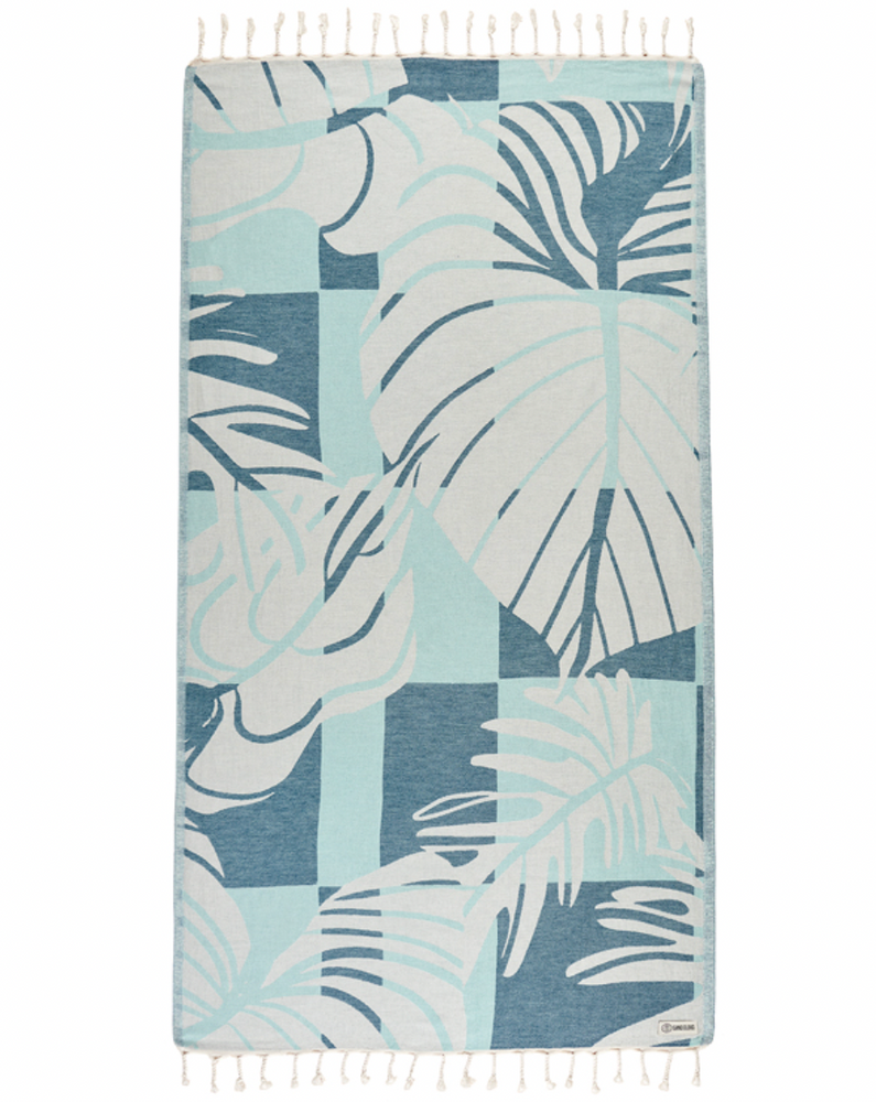 Enjoy your time in the sand with the eco-conscious Sand Cloud Cutleaf Towel, available at Harbour Thread boutique. 