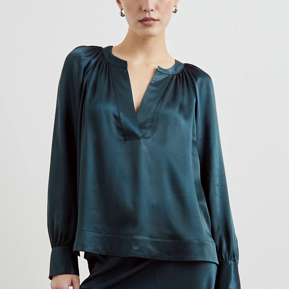 
                      
                        Front view of a woman wearing the Wynna Top by the brand Rails in the color Deep Sea
                      
                    