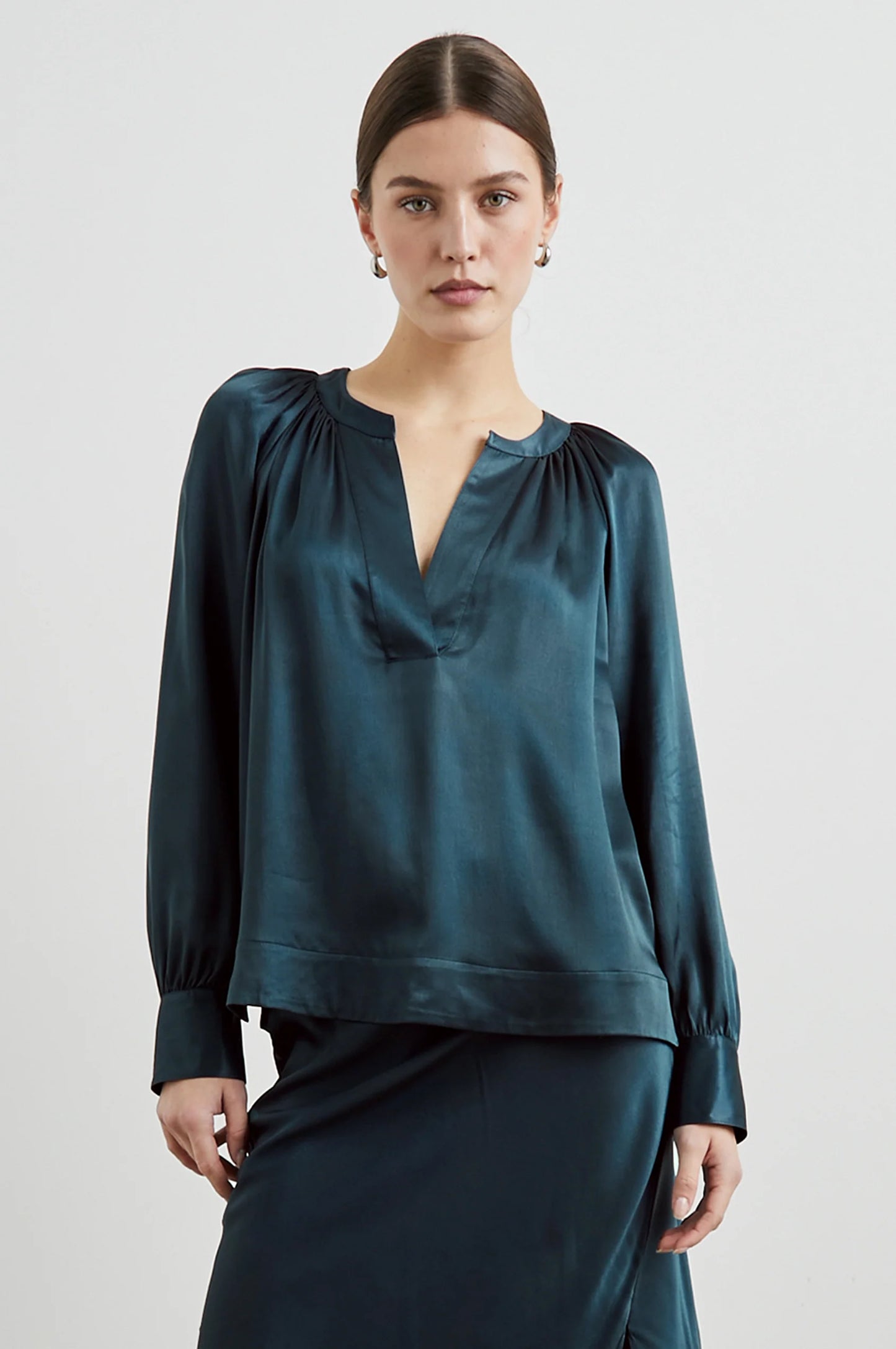 Front view of a woman wearing the Wynna Top by the brand Rails in the color Deep Sea