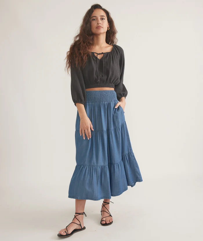 Front view of the Marine Layer Corinne Chambray Maxi Skirt in the color Medium Wash