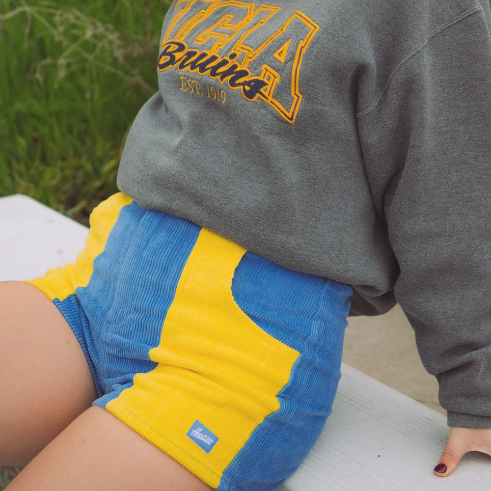 
                      
                        Outfit styled with the  two tone blue and gold women's shorts by Hammies
                      
                    