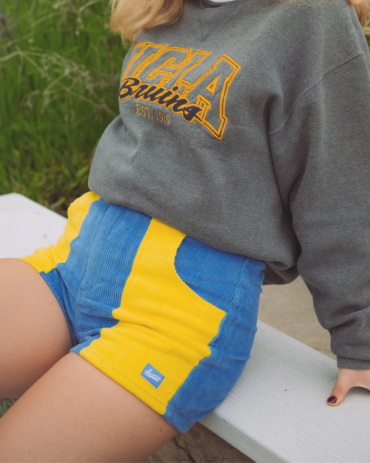 Outfit styled with the  two tone blue and gold women's shorts by Hammies