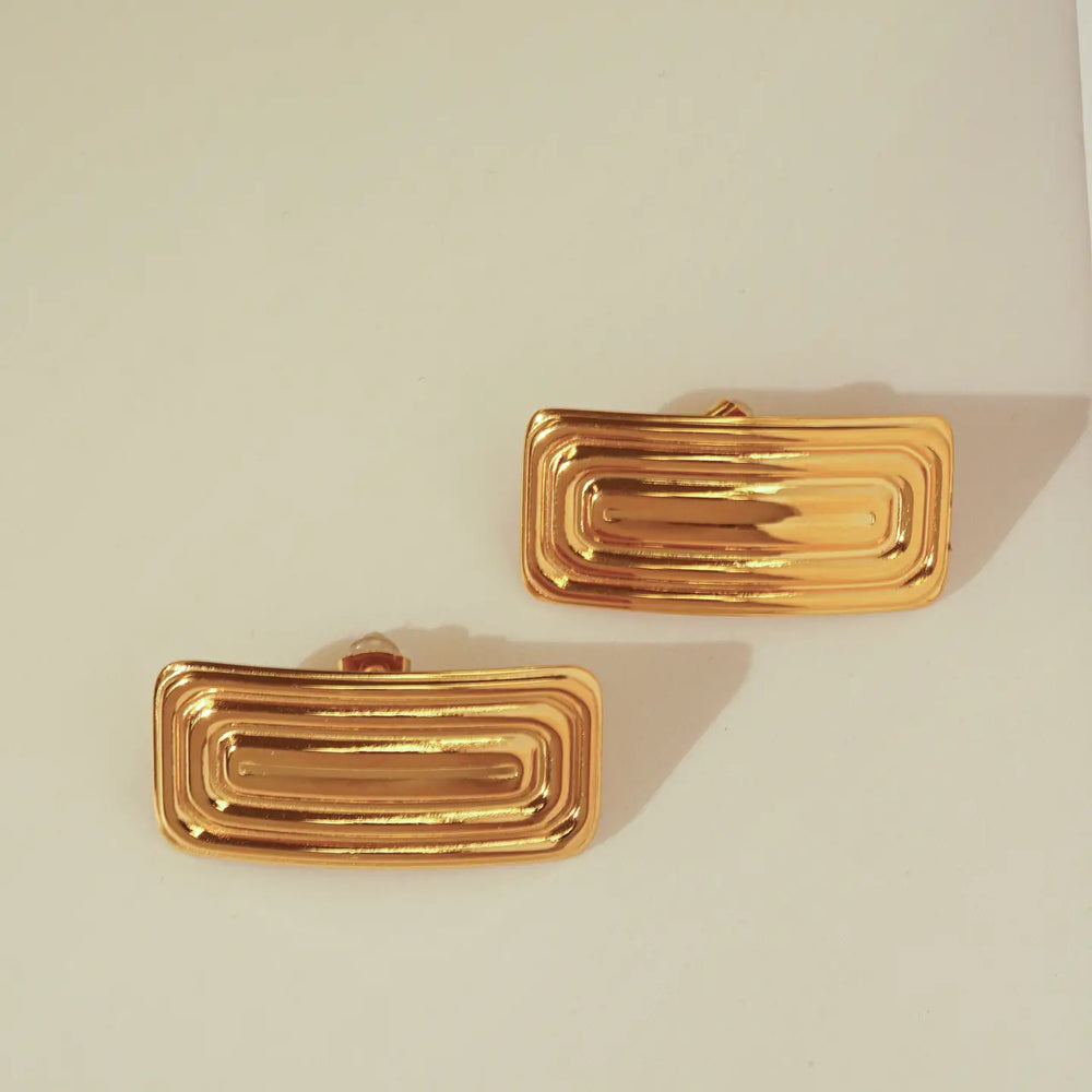 The KOZAKH Avetrix Earrings in Gold