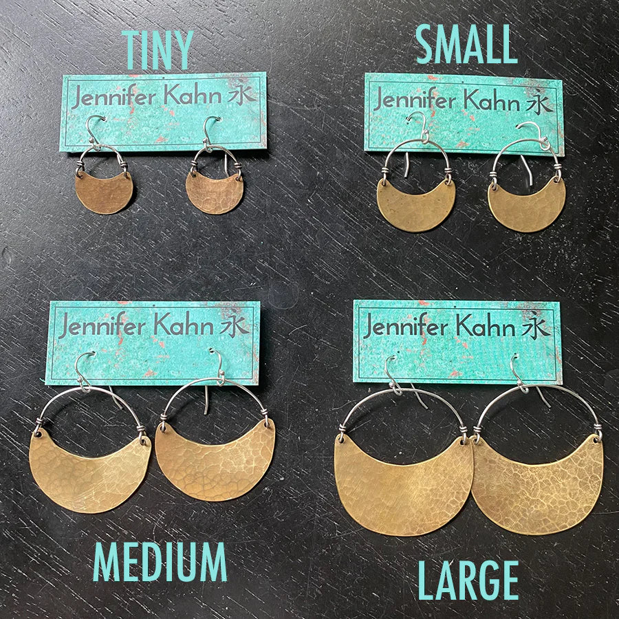 
                      
                        Size comparison of the Brass Crescent Earrings by Jennifer Kahn Jewelry
                      
                    