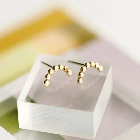 The Gold Hammered Dot Stud Earrings by The Land Of Salt