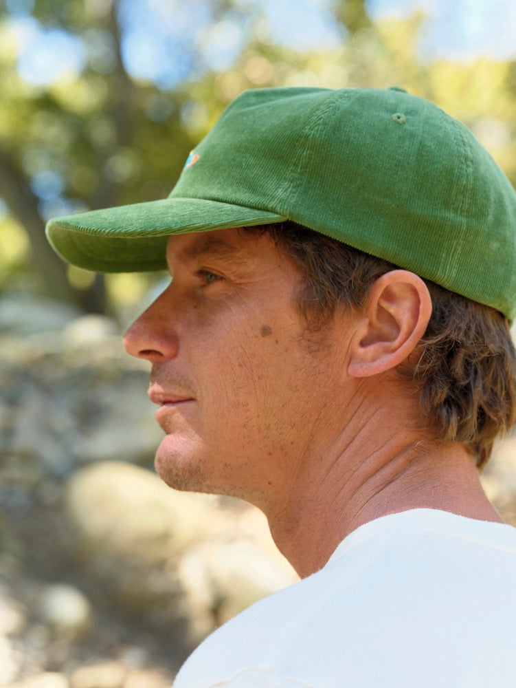 
                      
                        Man wearing the green corduroy Hot Salmon Polo Hat from Mollusk
                      
                    