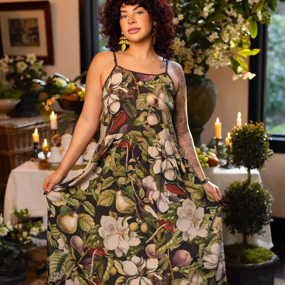 Woman wearing a floral maxi dress from Market Of Stars