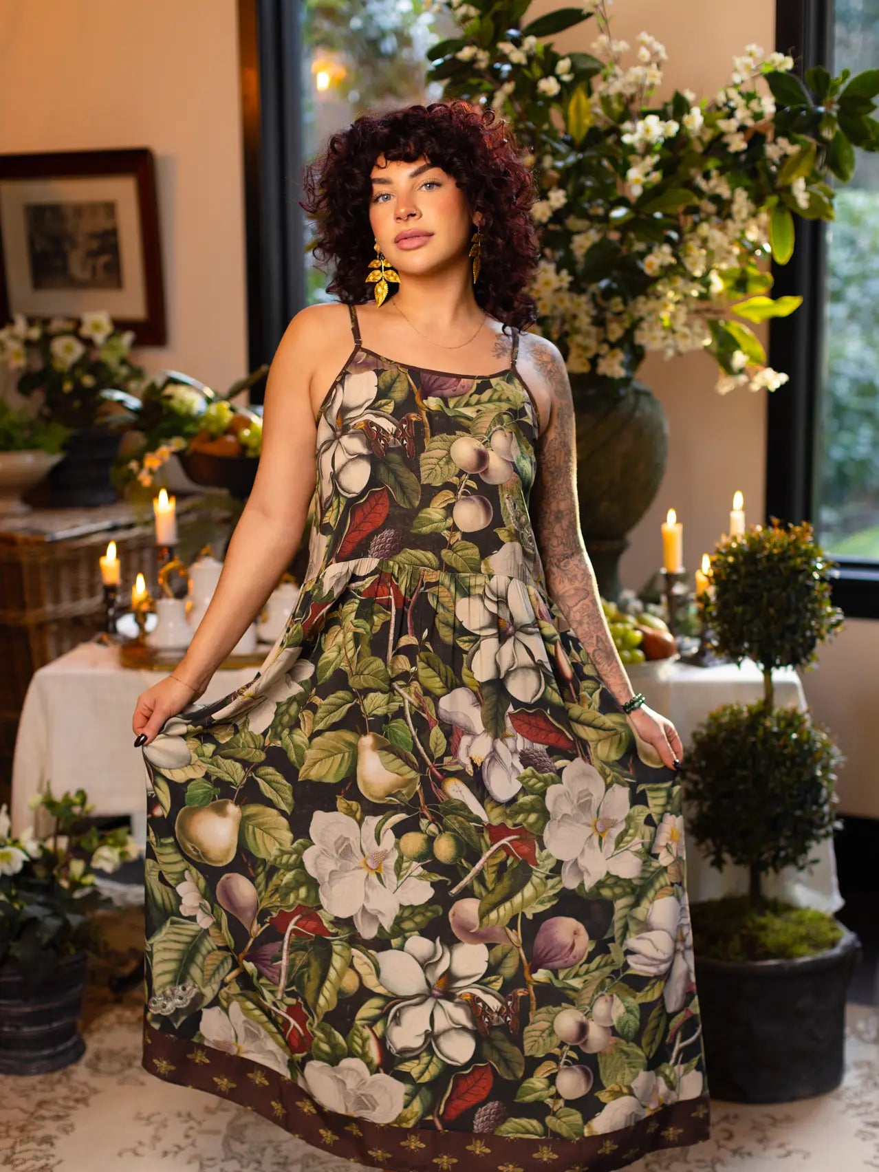 Woman wearing a floral maxi dress from Market Of Stars
