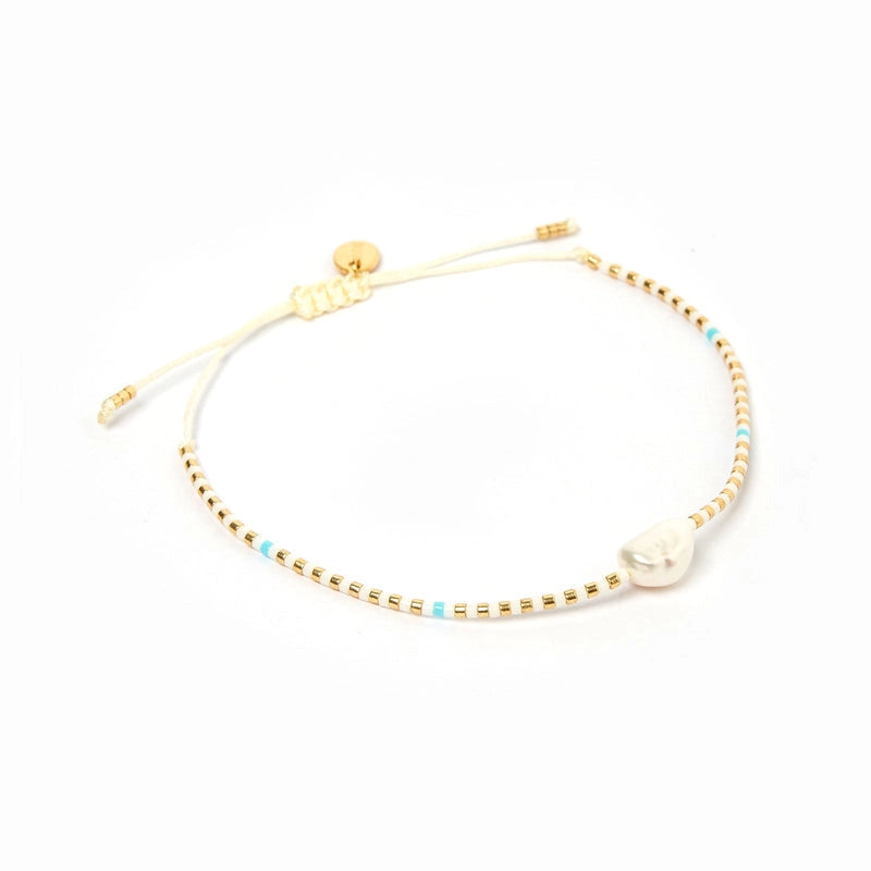 
                      
                        The White and Blue Turquoise Charlotte Bracelet by Arms of Eve.
                      
                    