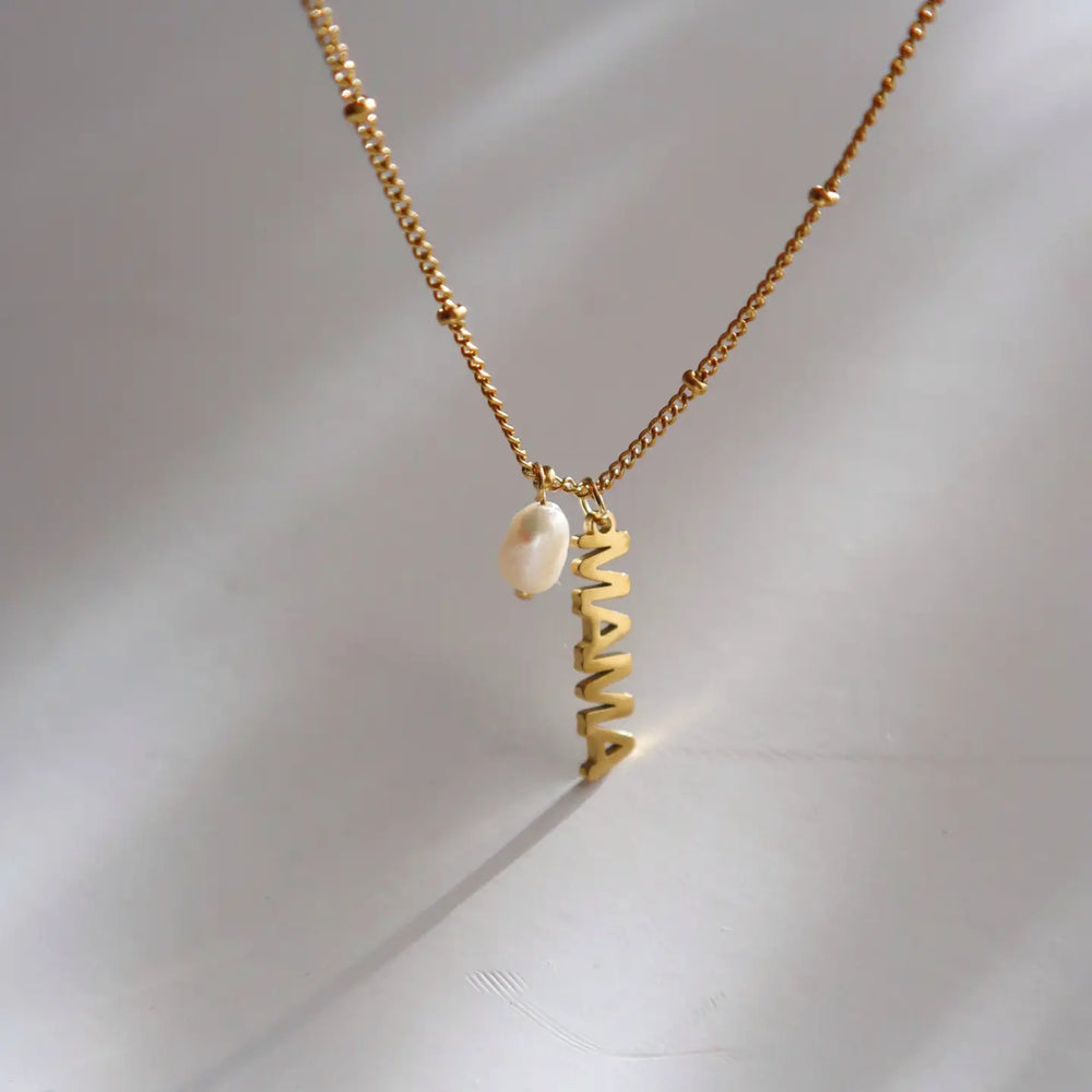 
                      
                        The Mama Pearl Charm Necklace by Jessa Jewelry
                      
                    