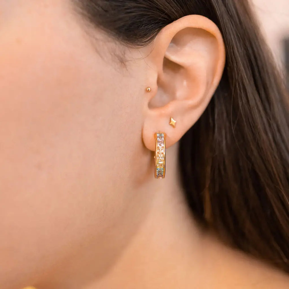 
                      
                        Woman wearing the Gold Pastel Ombre Hoop Earrings by The Land Of Salt
                      
                    