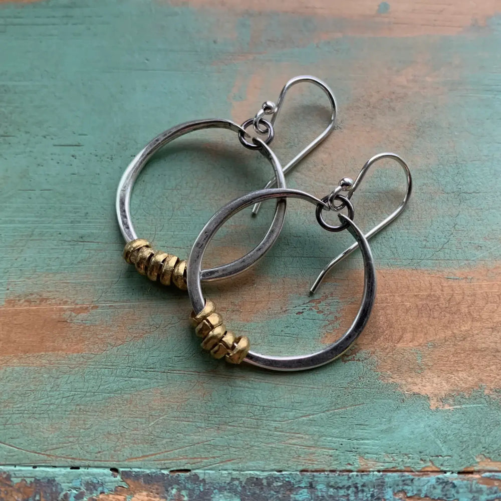 The Tiny Silver Hoop Earrings with Brass Heishi by Jennifer Kahn Jewelry