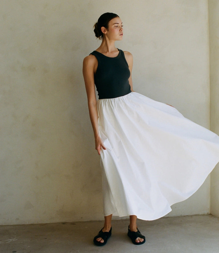 Shop this timeless Off-White Cotton Midi Skirt at Harbour Thread for effortless warm-weather style