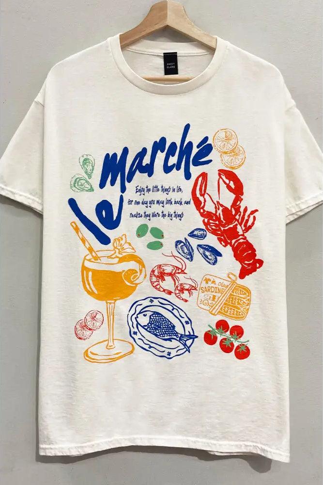 Dive into fresh summer style with the Le Marche Picnic Oversized Graphic Tee at Harbour Thread women's boutique in Burlington, VT. 