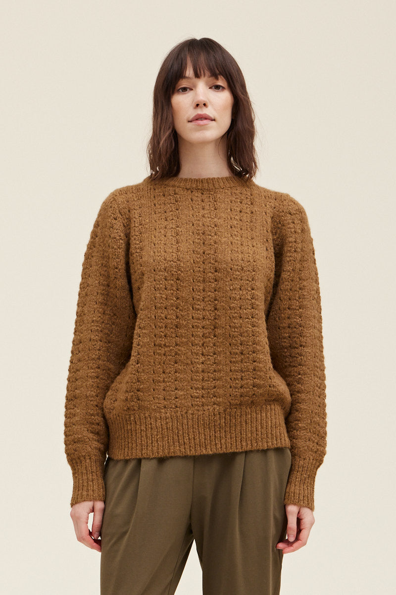 This brown textured women's pullover is an essential sweater for the season. Shop now at Harbour Thread to elevate your look. 