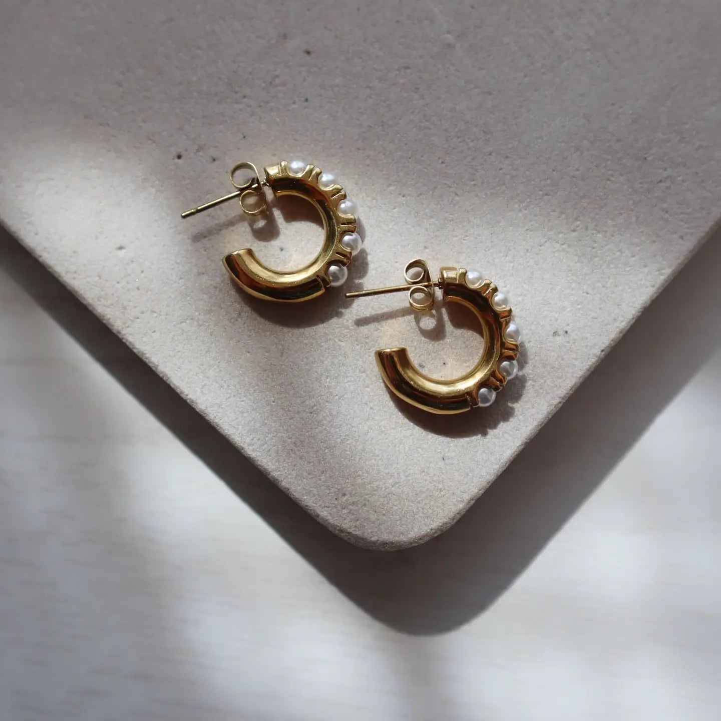 Pearl adorned hoop earrings