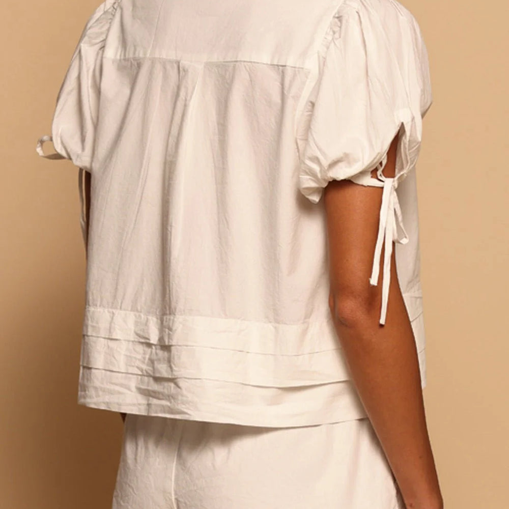 
                      
                        Back view of the Talia Button Down by Shore
                      
                    