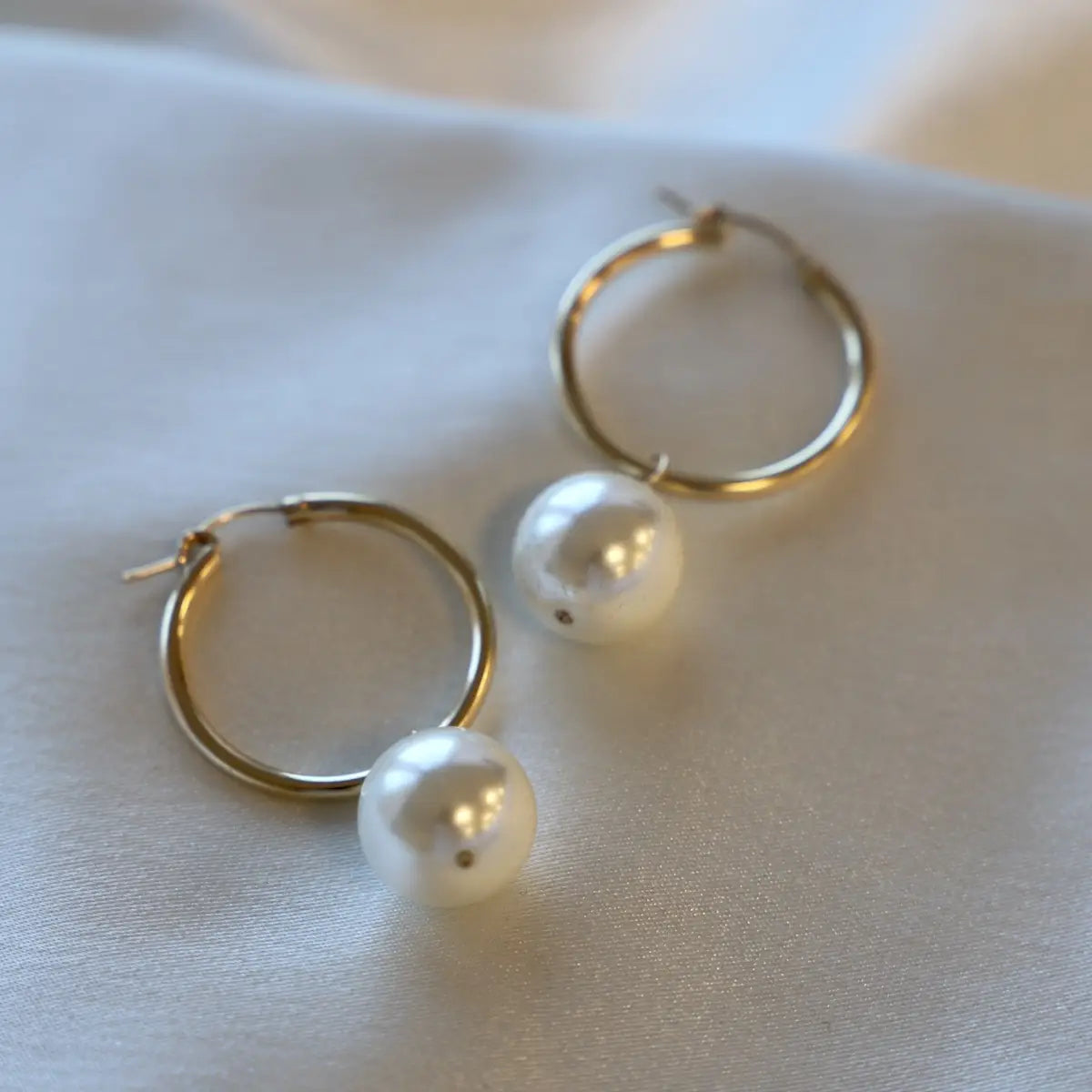 Shop the Oversized Audrey Pearl Hoops by Katie Waltman Jewelry at Harbour Thread boutique in Burlington, VT. 