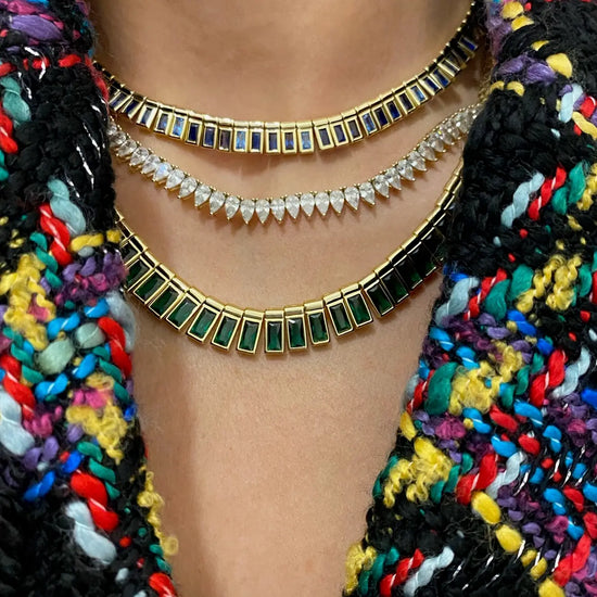 woman wearing the Grand Piano Emerald Necklace by Native Gem