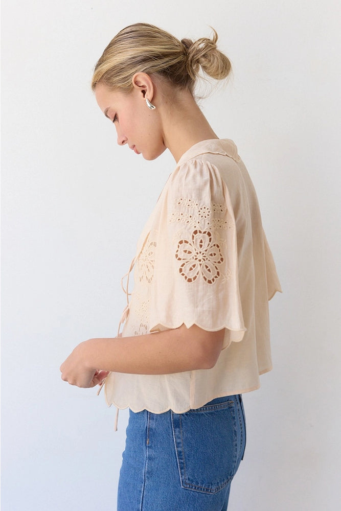 
                      
                        Embroidered Tie Front Blouse
                      
                    