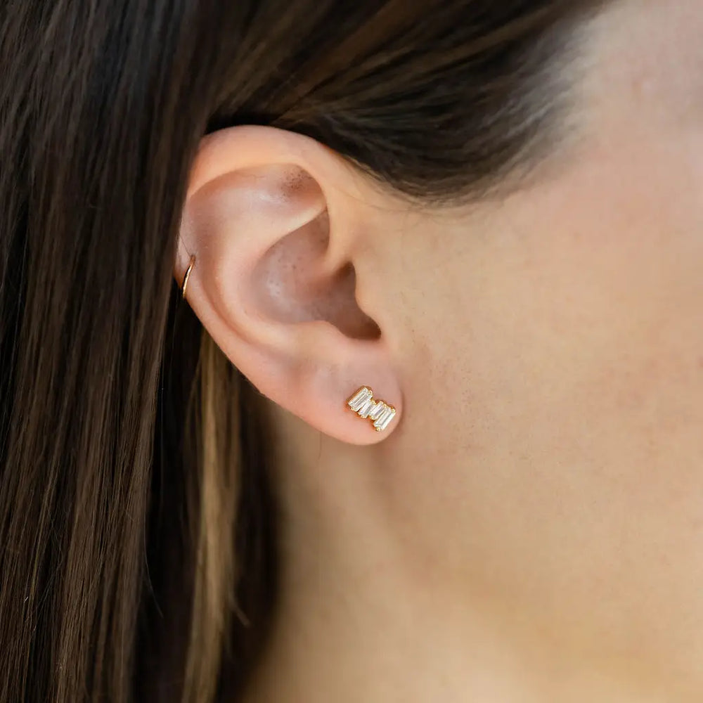 Woman wearing The Land Of Salt Gold Bridgette Diamond Cluster Stud Earrings