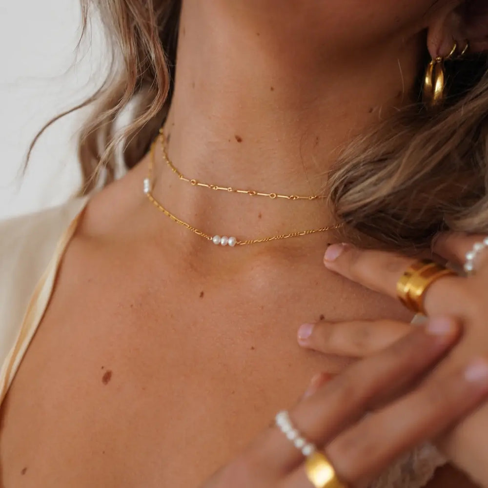 The Jasmine Necklace by May Martin is a great option to layer with other dainty chain necklaces