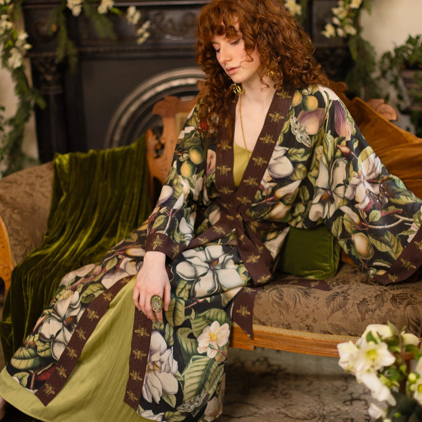 A woman wearing the Market Of Stars Fleur De Lune Opera Duster Kimono Robe