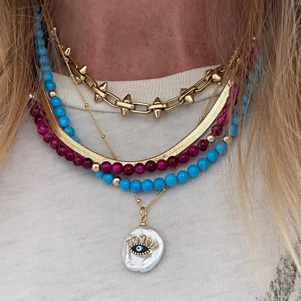 Woman wearing the Constance Necklace by Jessica Matrasko Jewelry