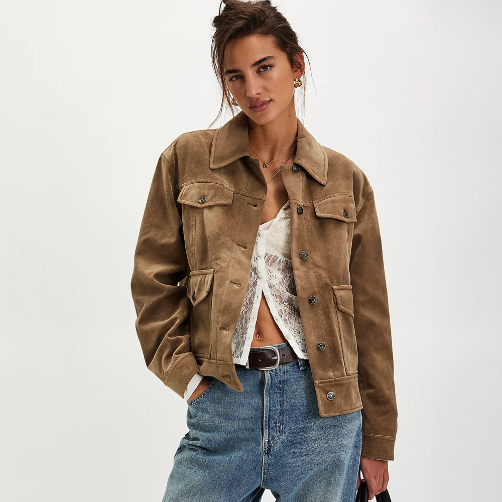Woman wearing the Free People Night Ranch Vegan Jacket