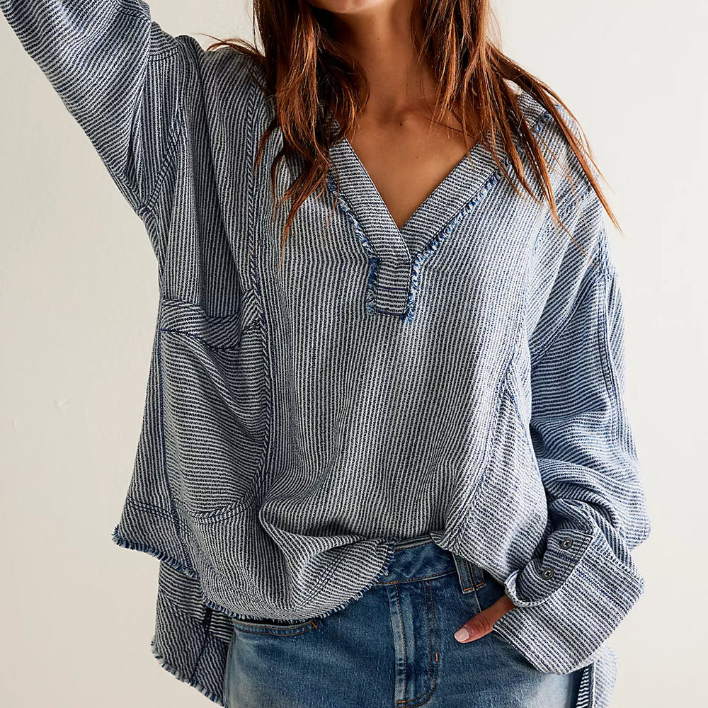 Women's oversized, slouchy striped top with a deep v-neckline