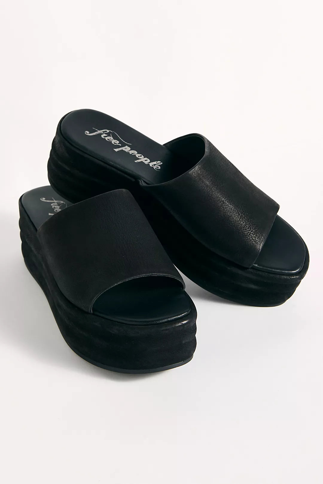 Free People's Black Harbor Flatform Sandals are available at Harbour Thread and are an effortlessly stylish summer sandal.