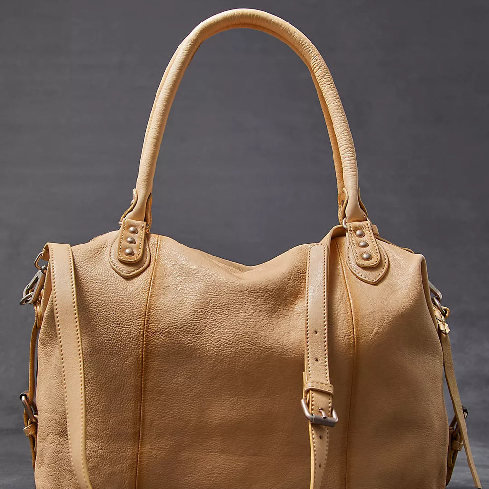 
                      
                        Women's leather go-to handbag by Free People
                      
                    