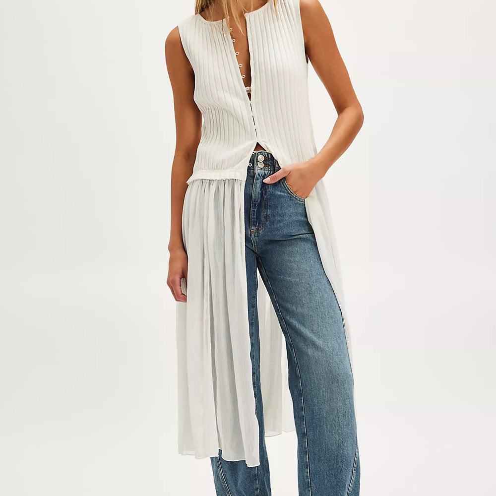Enjoy endless styling potential with the unique and versatile Free People Twice As Nice Maxi Top, now at Harbour Thread women's boutique in Burlington, VT. 