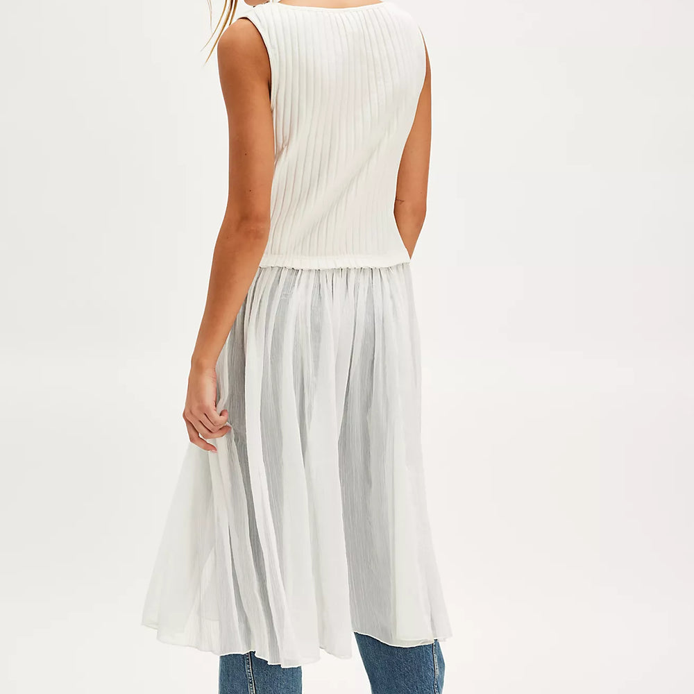
                      
                        The Free People Twice As Nice Maxi Top features a ribbed knit button front top with a chiffon skirt
                      
                    