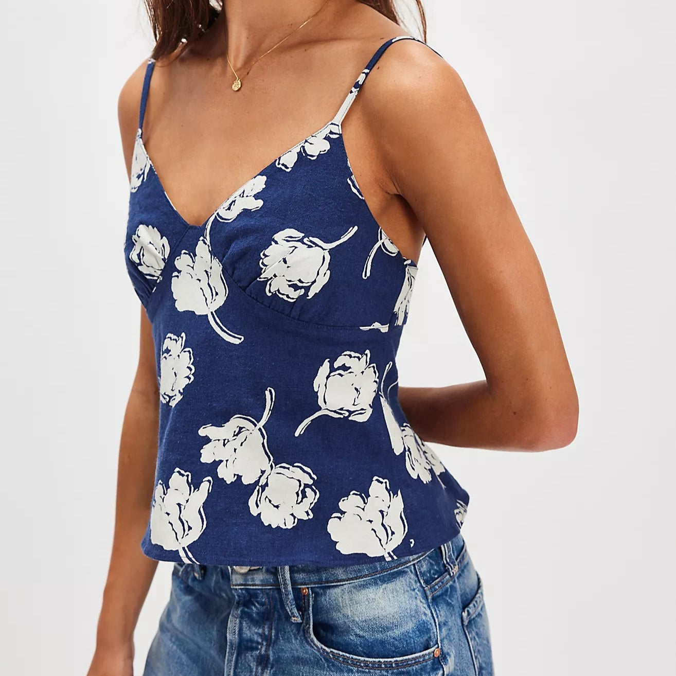 A sweet floral print adorns the effortlessly cute Free People Susie Printed Top, now at Harbour Thread women's boutique in Burlington, VT. 