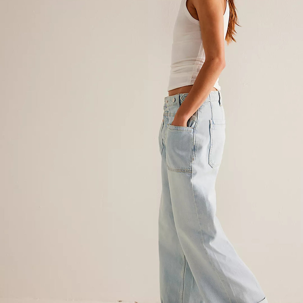 
                      
                        Side view of the light wash Palmer Cuffed Jean by Free People in the color Daydream Blue
                      
                    