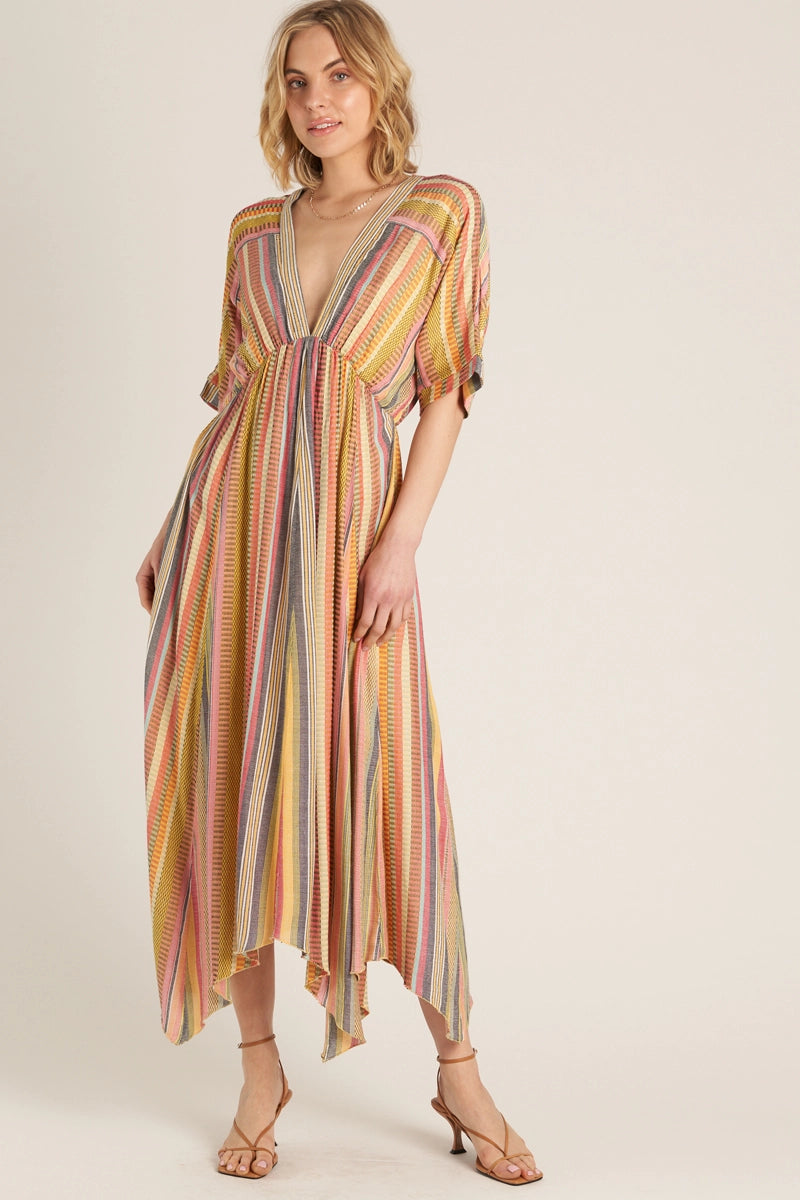 Relaxed yet elevated, this kimono sleeve maxi dress at Harbour Thread features colorful multicolor stripes for stand out sunny day style.
