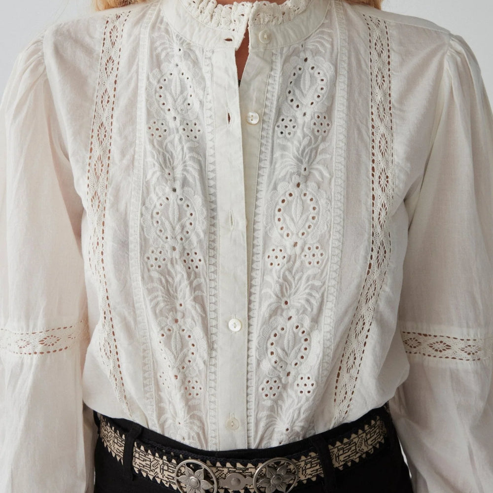 
                      
                        Front design detail on the Emmanuelle Blouse by Maison Hotel 
                      
                    